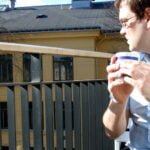 Me on my balcony, enjoying the spring sunshine