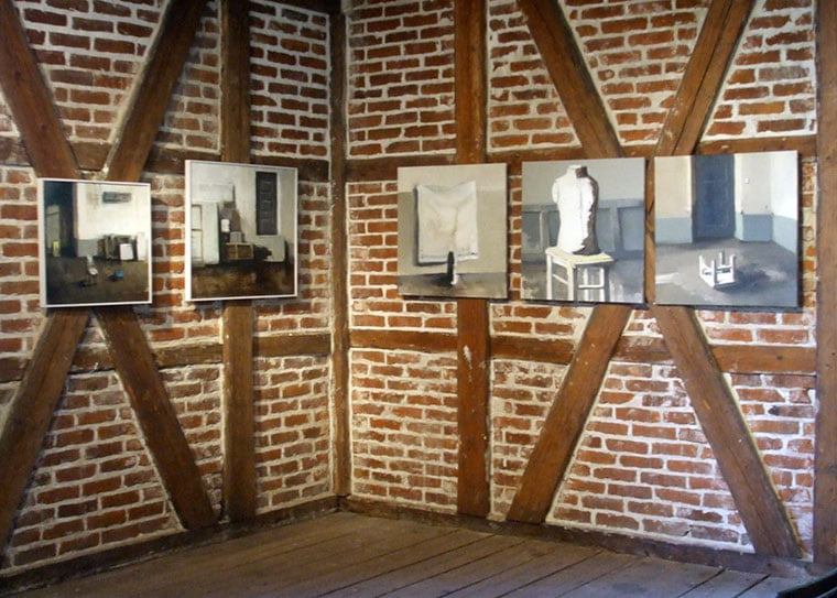 A temporary exhibition inside a beautiful timber-frame building on Hovedøya island near Oslo