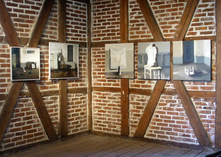 A temporary exhibition inside a beautiful timber-frame building on Hovedøya island near Oslo