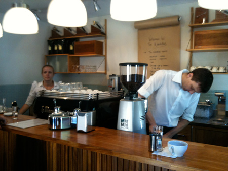 Tim Windelboe and a barista behind the counter