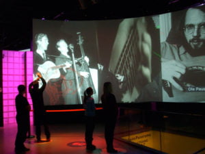 Giant video screens inside Rockheim