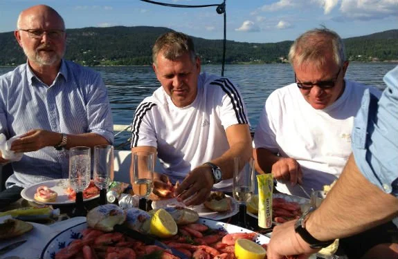 Workmates attacking the shrimp buffet
