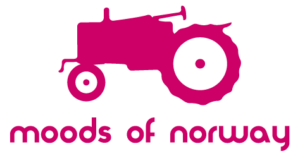pink tractor logo