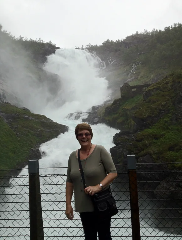Mum in front of the Kjosfossen waterfall