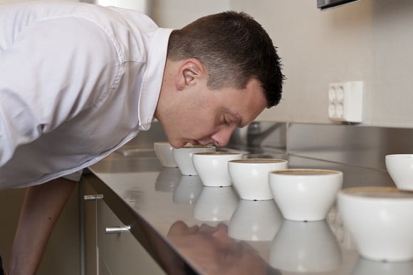 Tim Wendelboe examining his coffee in Oslo, Norway.