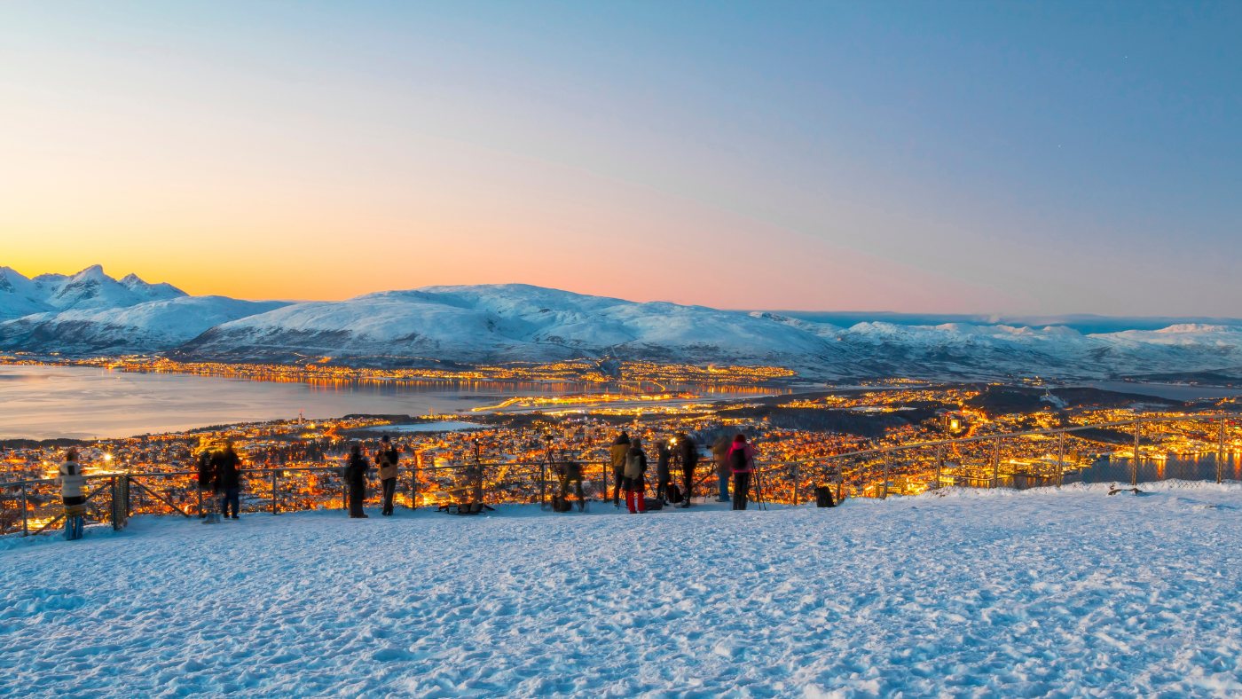 Visitors looking at Tromsø in the winter.