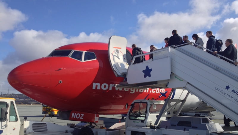 Passengers boarding a Norwegian flight