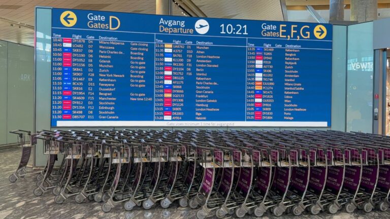International departure gate sign at Oslo Airport. Photo: David Nikel.