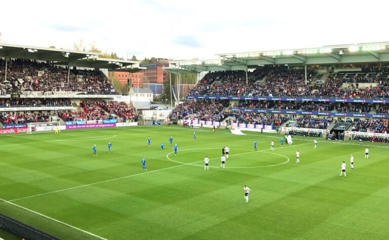 Norwegian football club Rosenborg playing at Trondheim's Lerkendal Stadium.