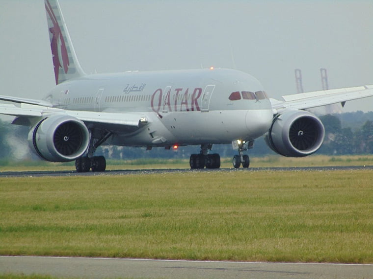 A Qatar Airways plane on the runway