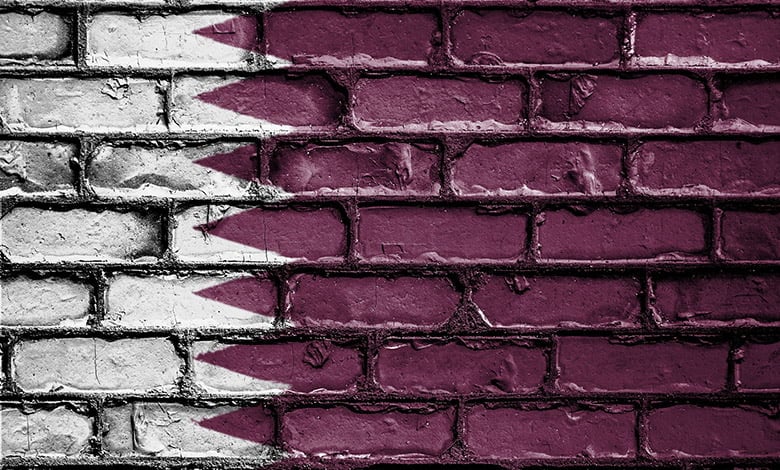 Qatar flag in a brick wall