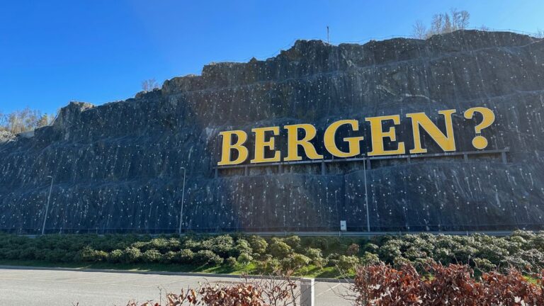 Large sign reading "Bergen?" outside the passenger terminal at Bergen Airport. Photo: David Nikel.