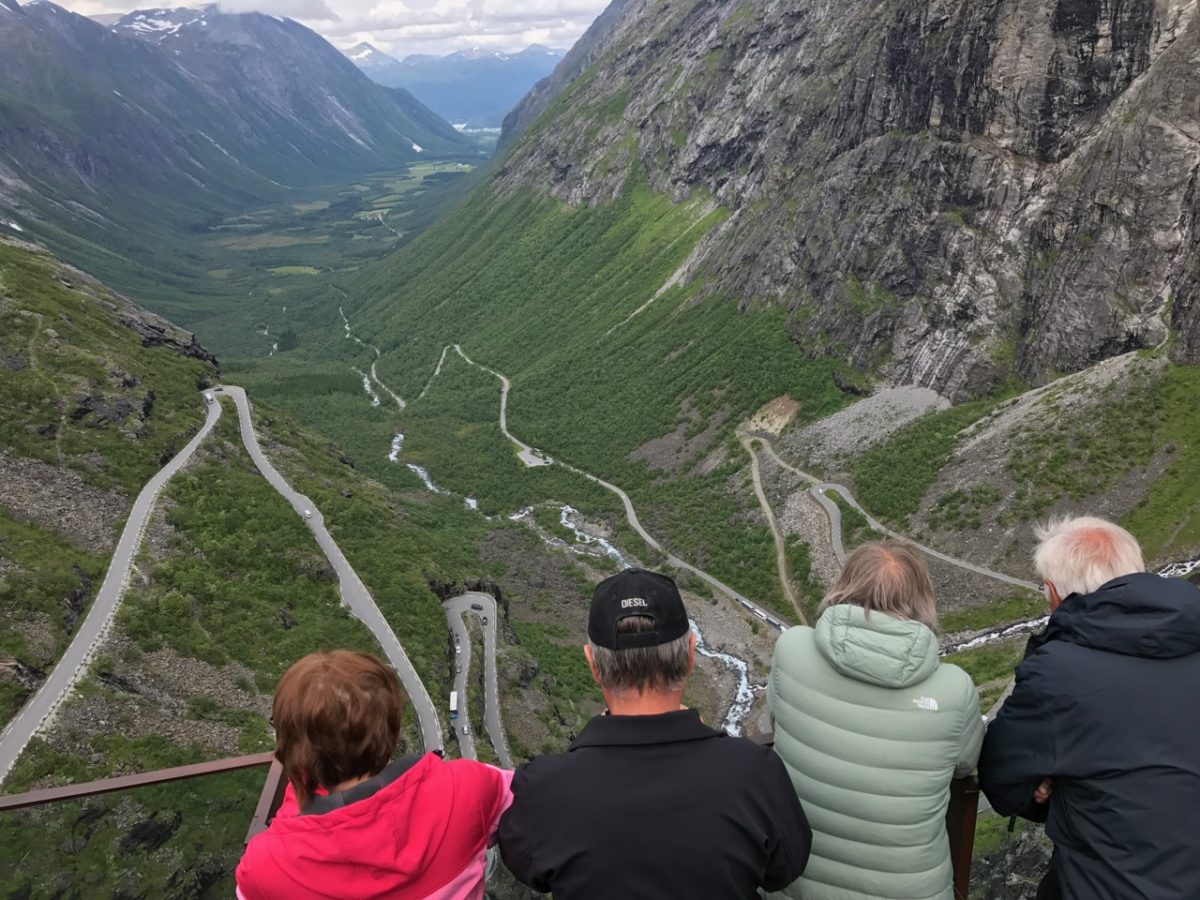 Tourists looking down on the Trollstigen mountain pass. Photo: David Nikel.