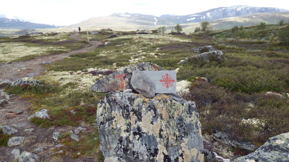 On the Pilegrimsleden heading towards Kongsvold with Dovrefjell in the background.