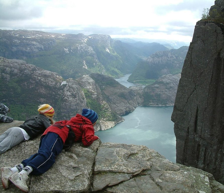 Children hiking to Preikestolen near Stavanger in western Norway