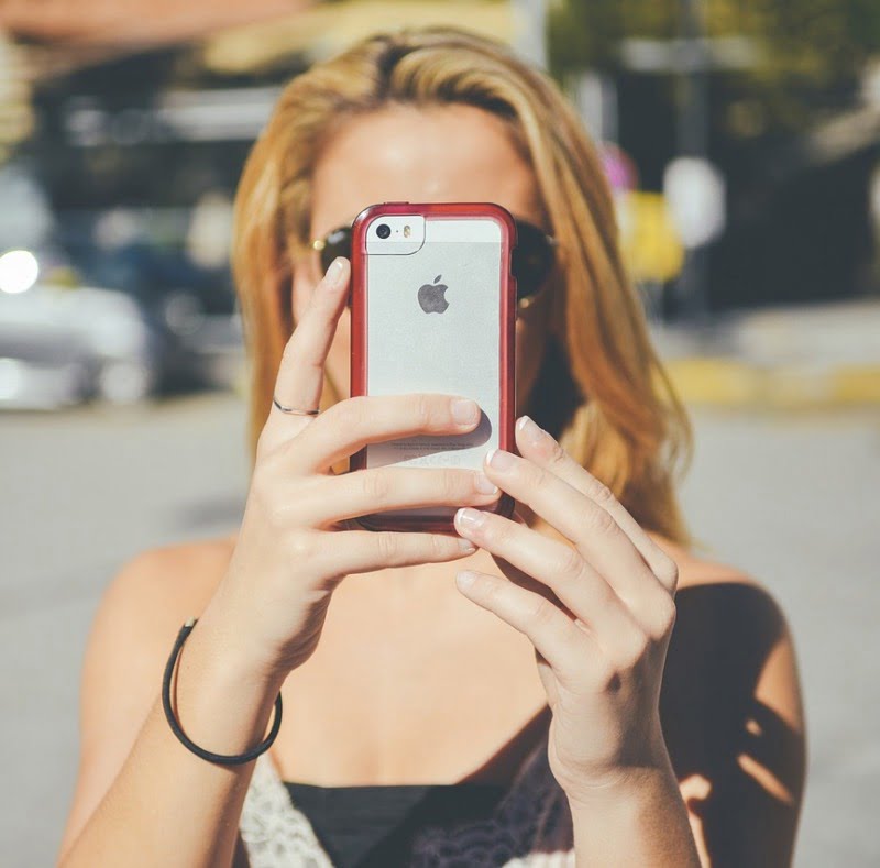 Norwegian woman using a smartphone