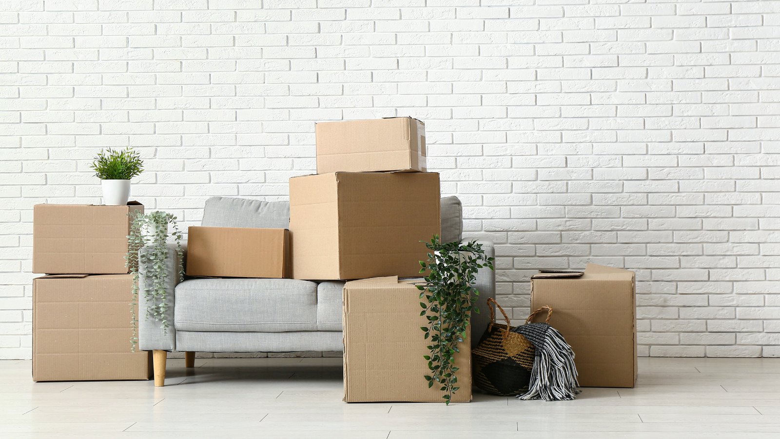 Moving boxes on a Scandinavian style sofa.