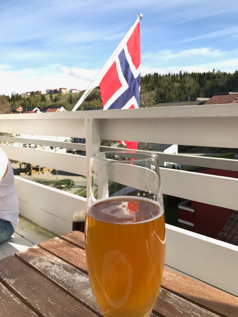 Celebrating Norway's National Day in a very British style, with a beer on our balcony.