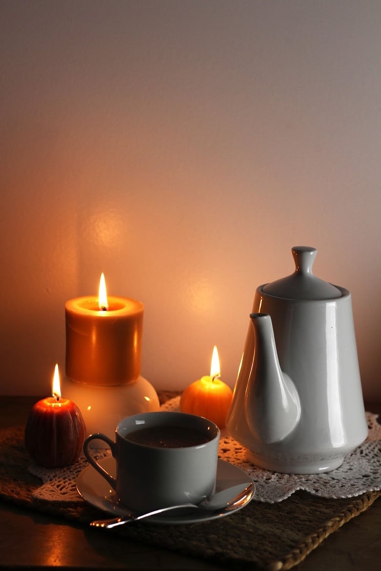 Hygge design: Candles help create a cozy minimalism in a Scandinavian home or cabin.