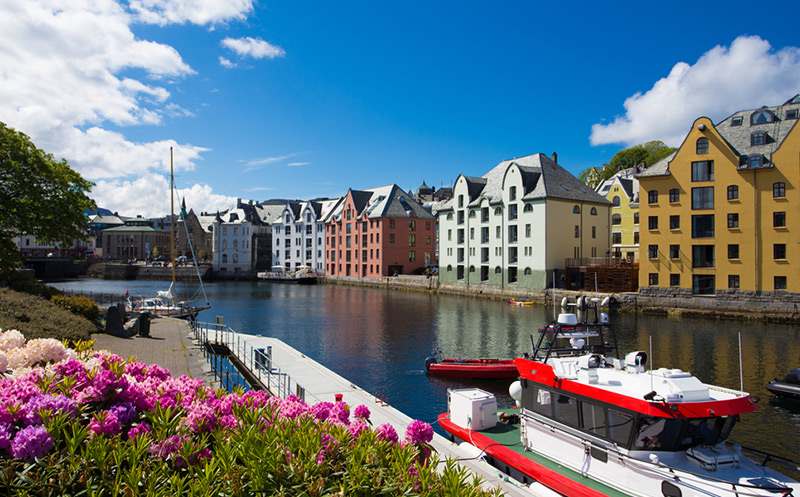 Beautiful canal and flowers in the city centre of Ålesund, Norway