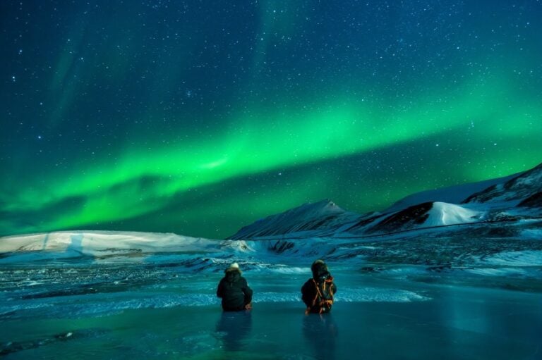 Aurora borealis above a frozen landscape