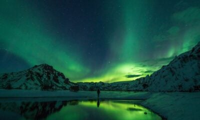 A bright green aurora borealis display in Norway