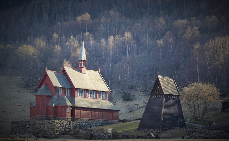 The newer church standing adjacent to Borgund stave church in Norway