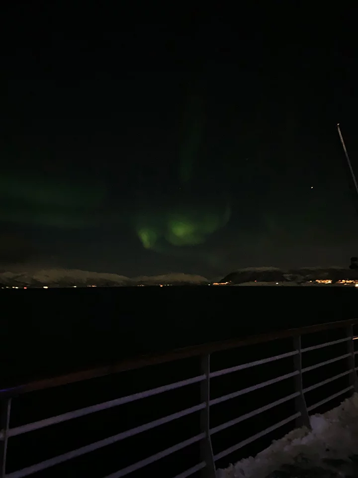 Watching the aurora borealis dance from the deck of the Hurtigruten ship MS Vesterålen