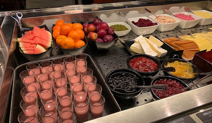 Fruit, jams and cheeses at the breakfast buffet