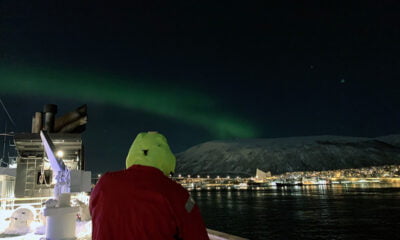 Northern lights visible from the Hurtigruten quay in Tromsø, Norway