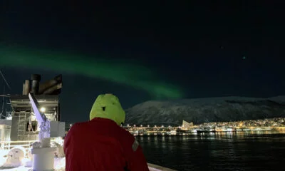 Northern lights visible from the Hurtigruten quay in Tromsø, Norway
