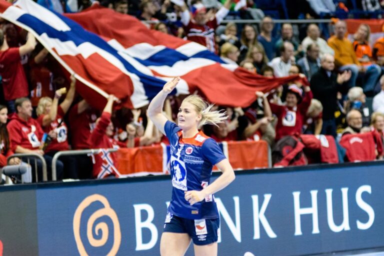 Veronica Kristi goal celebration during women handball game between Norway and Russia at IHF World Championship in 2017. Photo: Dan POTOR / Shutterstock.com.