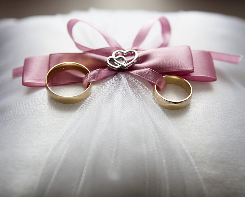 Wedding rings on a cushion