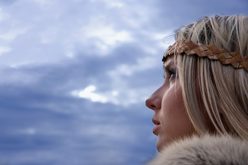 Life-like portrait of a pretty swedish blonde girl with big eyes