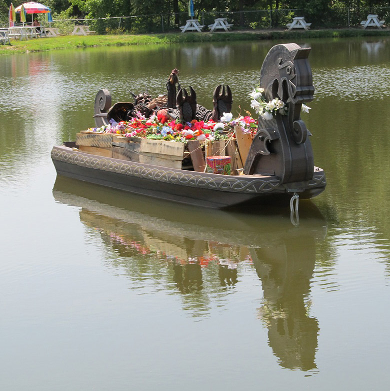 Mock viking funeral on a lake