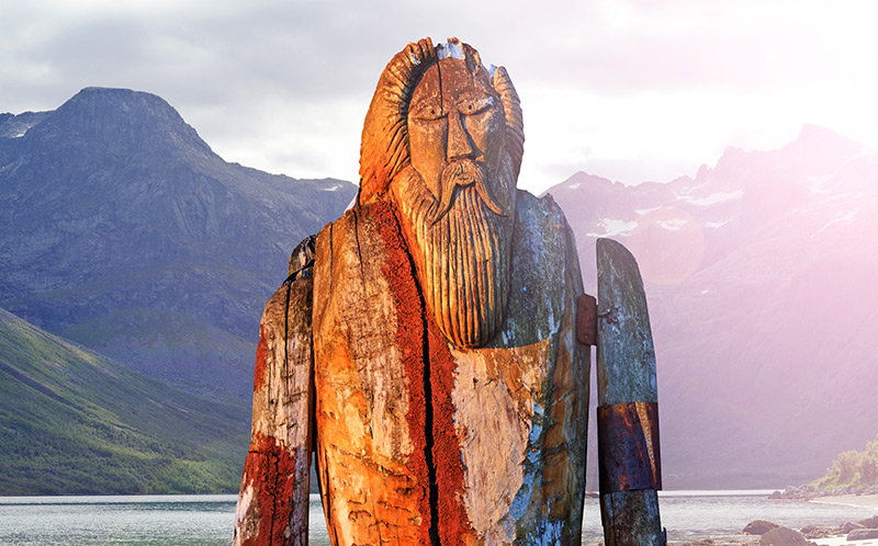 Norse God Odin by a fjord