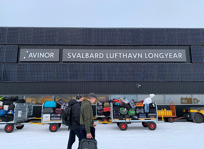 Walking from the plane to the terminal at Svalbard Airport Longyearbyen