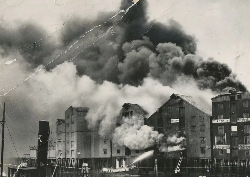Firefighters tackle a blaze at Albert E. Olsen wharf in Trondheim, Norway