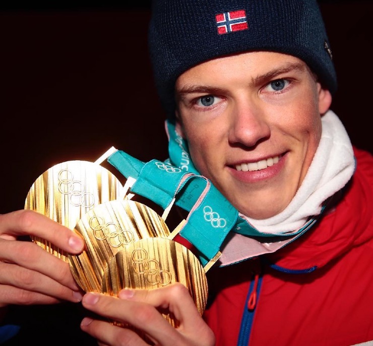 Johannes Klæbo with three Olympic gold medals