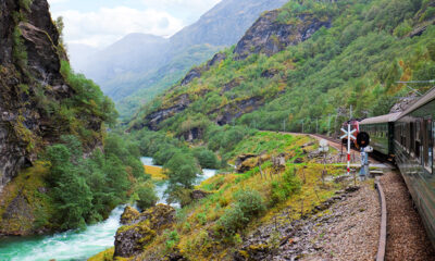 Train on a valley track in Norway