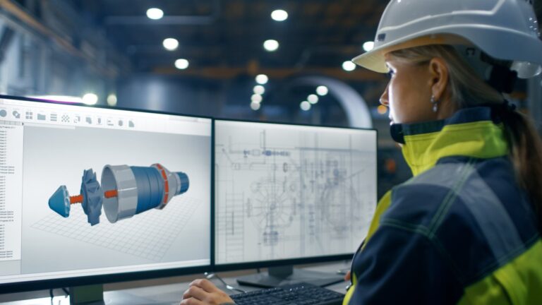 Engineer working on computer design program.