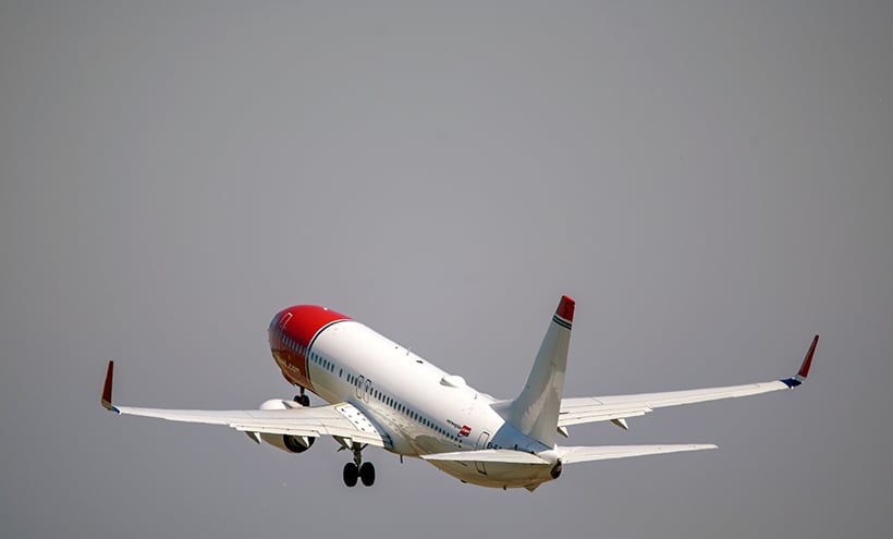 Norwegian Air plane taking off in Norway