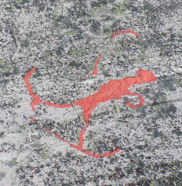 Rock carving showing a skier with bow and arrow in Alta, Norway