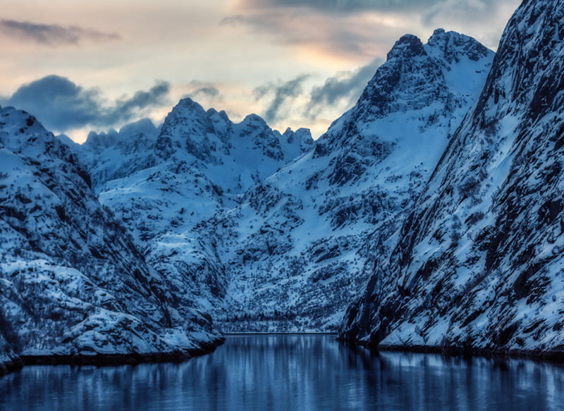 Snow-covered mountains at the Trollfjord