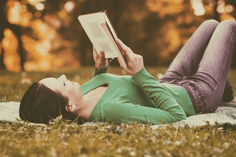 Woman reading a Norwegian novel