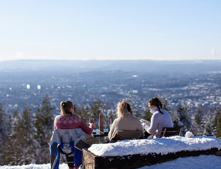 Three girls enjoying the view from Grefsenkollen in Oslo