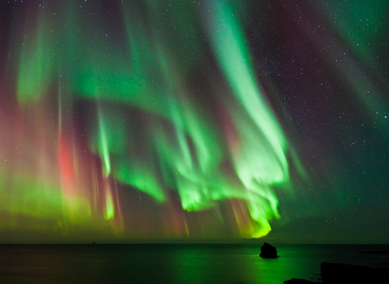 Ribbons of northern lights in the sky in Norway