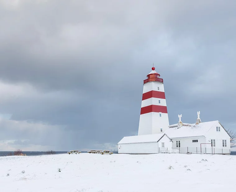 Alnes lighthouse near Ålesund in the snow