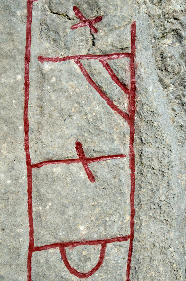 A close-up of Viking runes on a Scandinavian runestone