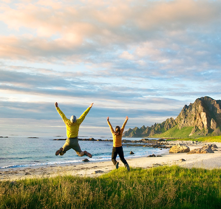 Happy couple on a beach in northern Norway